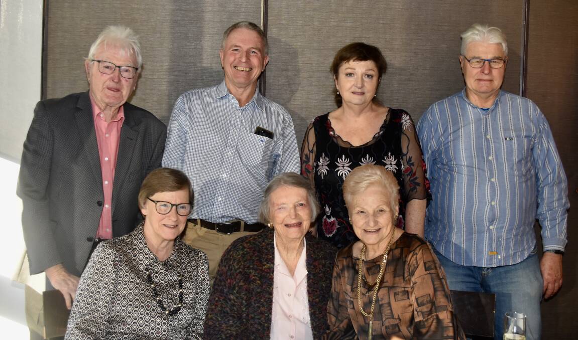 Marie Whalan (seated middle) at her 100th birthday party with (standing) Charles Rue, Robert Whalan, Bronwyn Leeper and Michael Roylance and (seated) Robyn Whalan and Geraldine Kennedy.