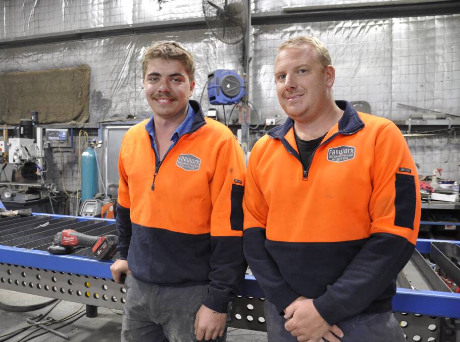 Joe Cramp with boss, Michael Waters at Goulburn business, Fabworx Steel Supplies and Fabrication. Picture by Louise Thrower.