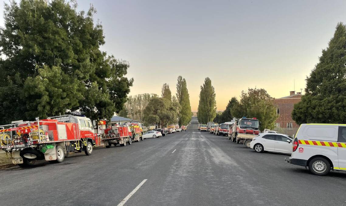 Taralga's main street was once again lined with fire trucks ready for another busy day fighting the Curraweela blaze. Picture by Noelene Cosgrove. 