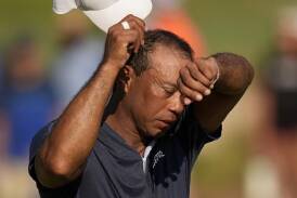 Tiger Woods says he doesn't know if he'll be back at another US Open after missing the cut. (AP PHOTO)